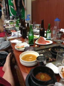 Aftermath of the Koreans-only Tuesday night BBQ at one of 2 tables after it had been half cleared... Good times.